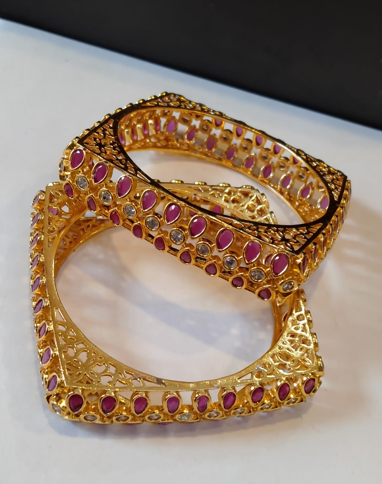 PAIR OF INDIAN KARAS IN RED & ZIRCONS