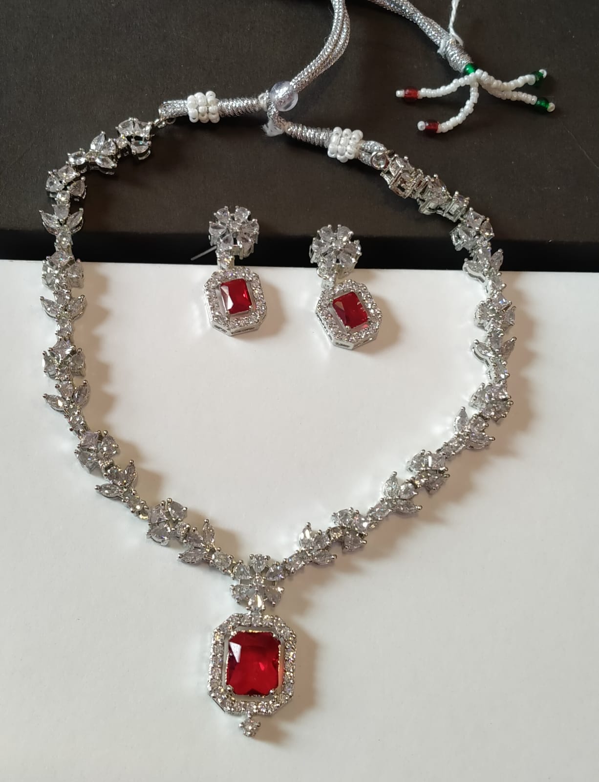 ELEGANT ZIRCON SET IN RED