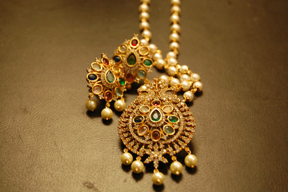 INDIAN MULTI JEWELLED PENDENT IN PEARL STRING