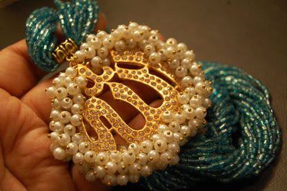 CALLIGRAPHIC PENDENT IN FEROZY MALA