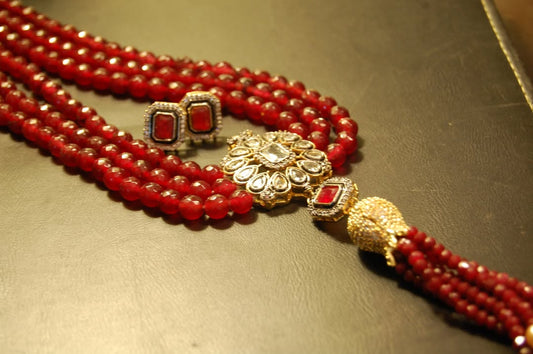 RUBY RED LONG MALA WITH TUSSEL