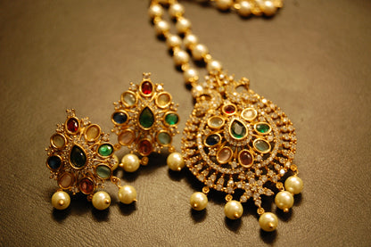 INDIAN MULTI JEWELLED PENDENT IN PEARL STRING